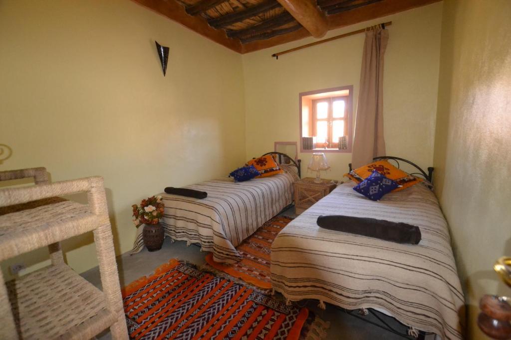 Tizourgane Kasbah Hotell Tiguissas Rom bilde